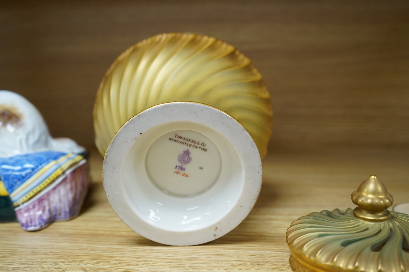 A Worcester pot pourri, cover and liner, signed E.M. Fildes, 20cm high